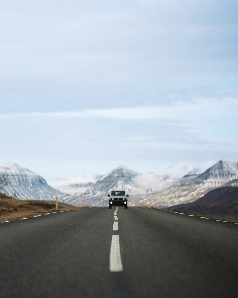 Currency of Iceland driving a rental car