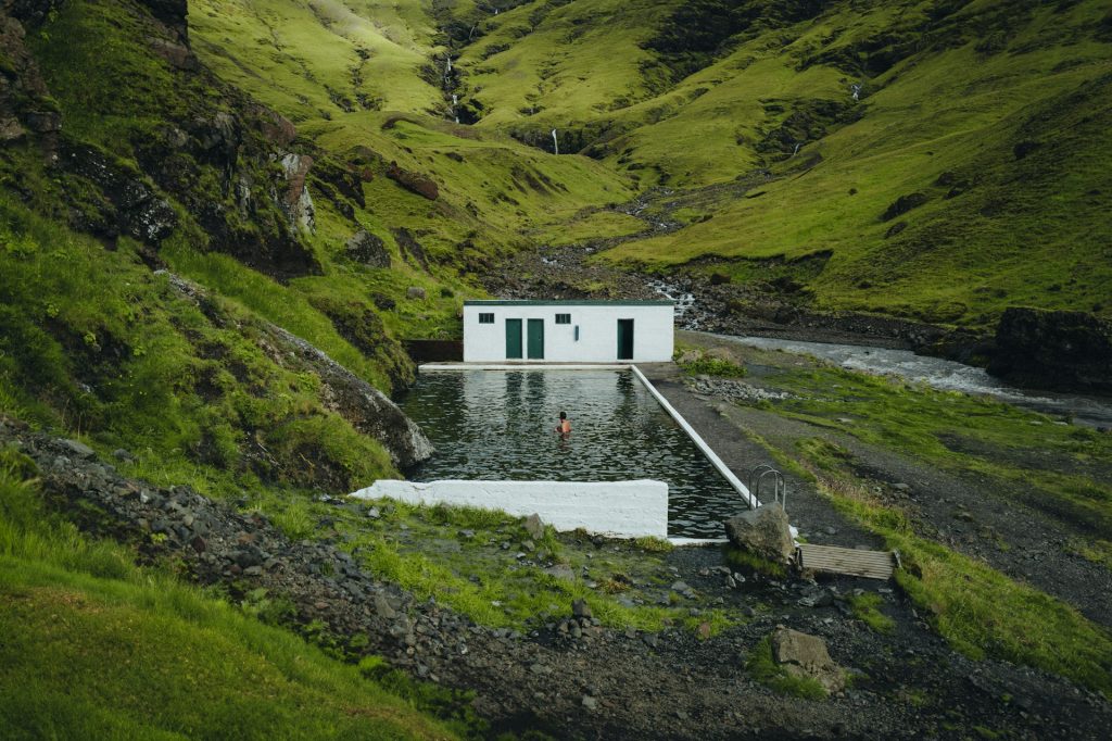  Seljavallalaug is one of Iceland’s oldest and most scenic swimming pools