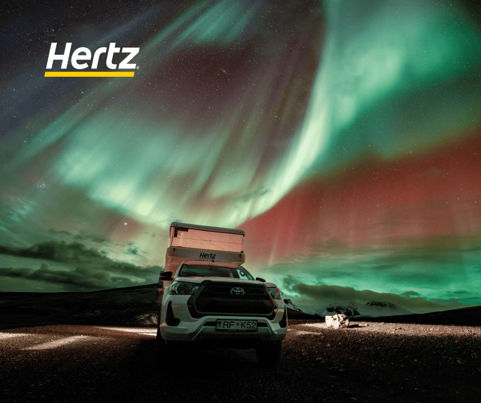 a 4WD rental camper car in iceland under the northern light