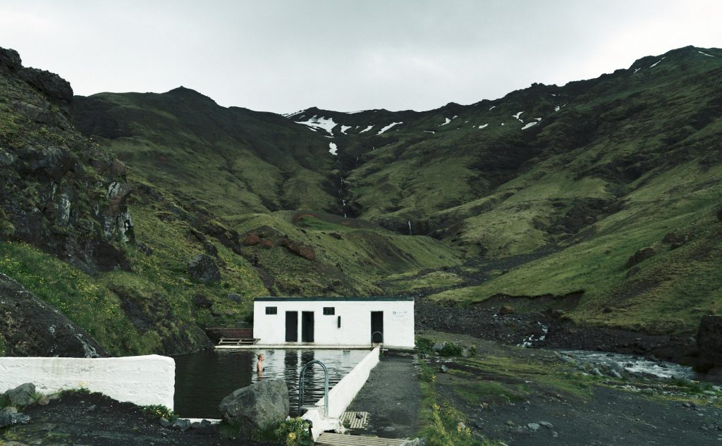 summer at the Seljavallalaug Swimming Pool in South Iceland