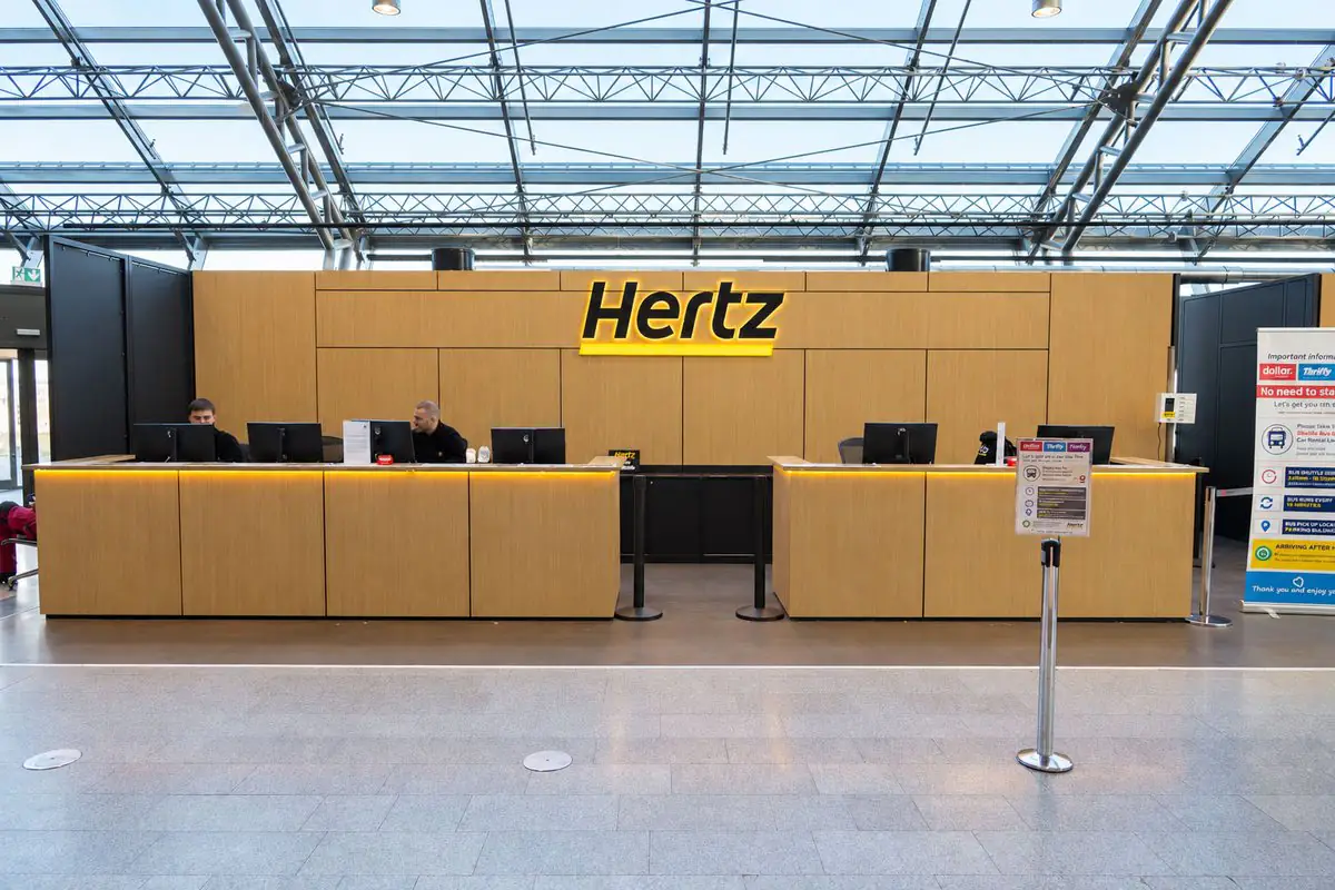 Hertz desk in the arrivals hall at Keflavík International Airport